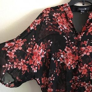 Black, flowered sheer blouse